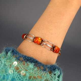 Beautiful geometrical designed link bracelet in silver with amber cabochons