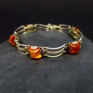 Beautiful geometrical designed link bracelet in silver with amber cabochons