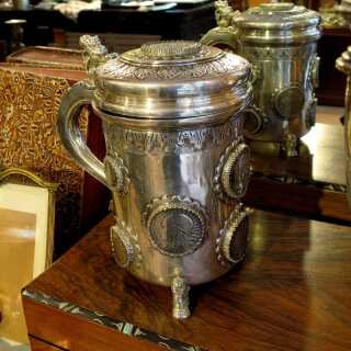 Massive and heavy silver mug with coin medallions