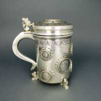 Massive and heavy silver mug with coin medallions