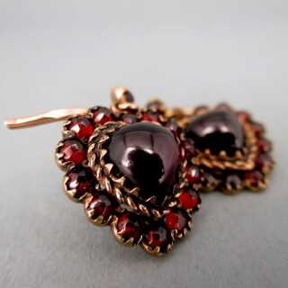 Prächtige herzförmige Ohrringe in Gold mit roten Granatsteinen