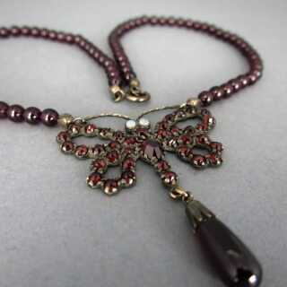 Butterfly collier in gold and silver with garnets and pearls