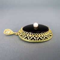 Antique pendant with black onyx and pearl filigree frame in silver and gold