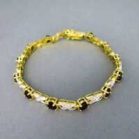 Vintage tenis link bracelet in gold and silver with heart shaped red garnets