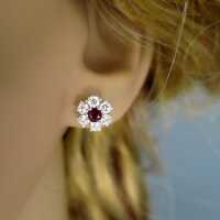 Wonderful flower shaped white gold stud earrings with diamonds and rubies