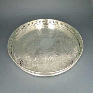 Rich decorated big round tray with galery rim silver plated England edwardian