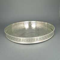 Rich decorated big round tray with galery rim silver...