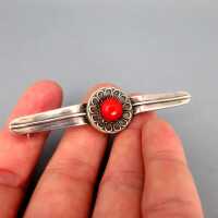 Beautiful brooch in silver with red coral cabochon in flower vintage jewelry