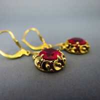 Wonderful romantic dangling gold earrings with pink spinel stones