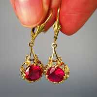 Wonderful romantic dangling gold earrings with pink spinel stones