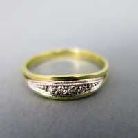 Schöner Damen Ring in Gold besetzt mit mehreren...