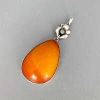 Antique Art Nouveau silver pendant with huge butterscotch amber and green agate