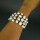 Herrliches breites Armband mit barocken Perlen in Silberfassung