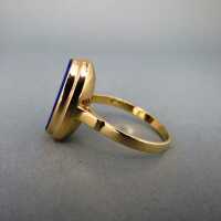 Beautiful gold ring with a huge deep blue lapis lazuli cabochon