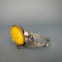Silver bangle with huge yellow butterscotch amber cabochon