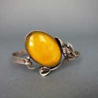Silver bangle with huge yellow butterscotch amber cabochon