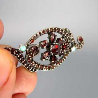 Beautiful garnet brooch with opals