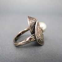 Unique abstract sterling silver womans ring with a beautiful pearl