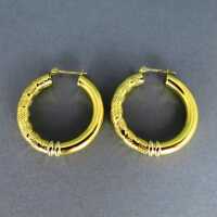 Wonderful decorated women creole earrings in 18 k yellow...