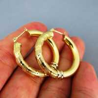 Wonderful decorated women creole earrings in 18 k yellow gold