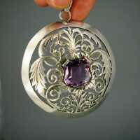 Antique Art Nouveau silver pendant with amethyst shield and acanthus leaves