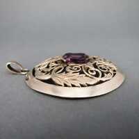Antique Art Nouveau silver pendant with amethyst shield and acanthus leaves