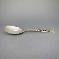 Rich decorated Art Deco cream serving spoon in massive silver