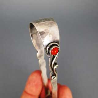 Beautiful Art Deco sugar tongue in silver with red coral cabochon