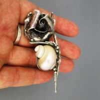 Unique abstract rose brooch in 950 silver with mother of pearl snail