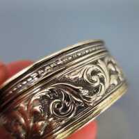 Beautiful Art Nouveau silver and gold pill box with putto and roses garlands