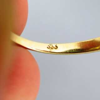 Eleganter Damen Ring in Gold mit tiefroten Granatsteinen