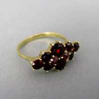 Eleganter Damen Ring in Gold mit tiefroten Granatsteinen