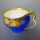 Antique Art Nouveau KPM Berlin porcelain cup with saucer in blue and gold