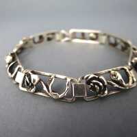 Delicate silver link handmade bracelet open worked with roses 