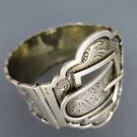Massive silver belt buckle bangle with rich floral relief
