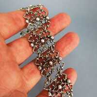 Silver link bracelet with heavy open worked filigree design