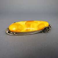Big brooch and pendant with gorgeous butterscotch egg yolk amber cabochon