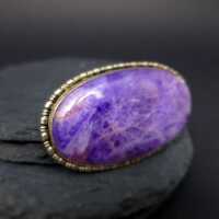 SIlver brooch with a huge violet amethyst quartz cabochon