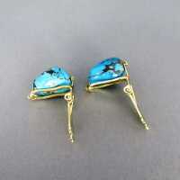 Beautiful gold ear clips filled with natural blue turquoise nuggets