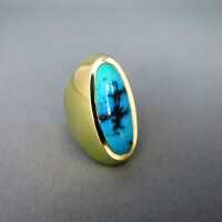 Interesting shaped gold ring with a natural blue turquoise cabochon
