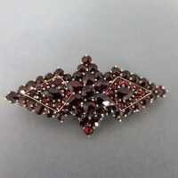 Antique gold doublé and bohemian red garnet brooch...