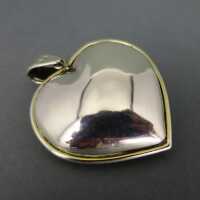 Huge antique heart shaped pendant in silver and gold, filled with red ruby