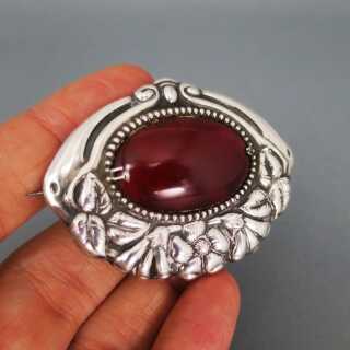 Gorgeous huge Art Nouveau repoussee floral brooch in silver with carnelian