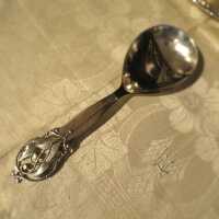 Silver Art Deco serving spoon with leaf and tendril decor Carl M. Cohr Denmark