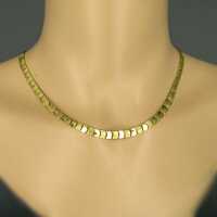 Elegant geometrical collier in gold with square elements