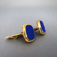 Elegant gold cufflinks with deep blue lapis lazuli slices