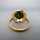 Modernist ladys gold ring with a huge round green spinel stone