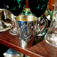German Jugendstil christening mug in silver and gold with rich relief decoration
