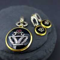 Jewelry set with pendant and earrings in silver and gold with onyx and tourmaline