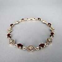 Elegant link bracelet in sterling silver with garnets and...